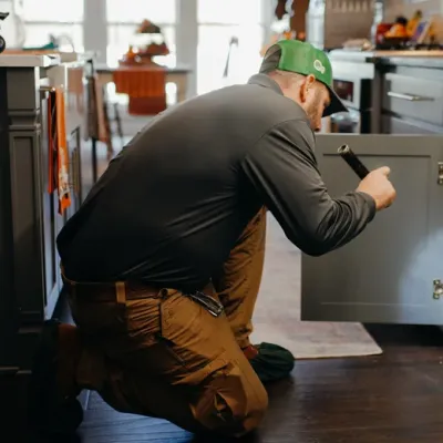 technician inspecting kitchen