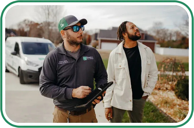 Sherrill Pest Control Technician speaking with customer