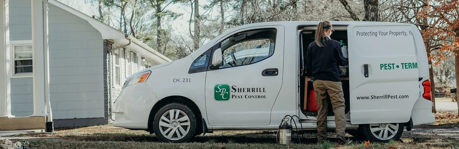 Sherrill Pest Control technician and van