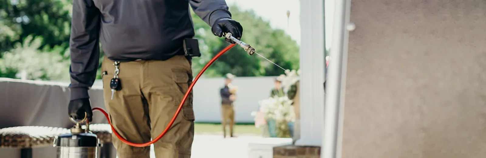 spraying house exterior