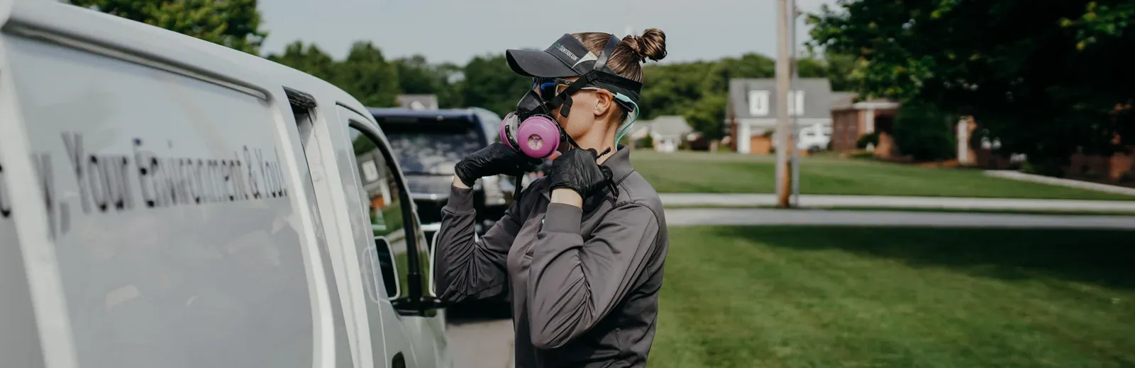 technician preparing to spray for mosuitoes