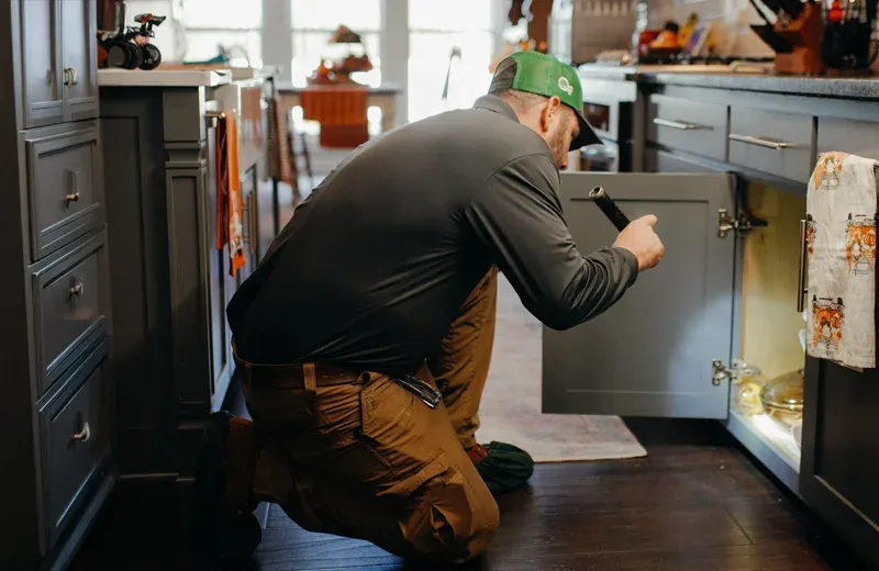 technician inspecting kitchen