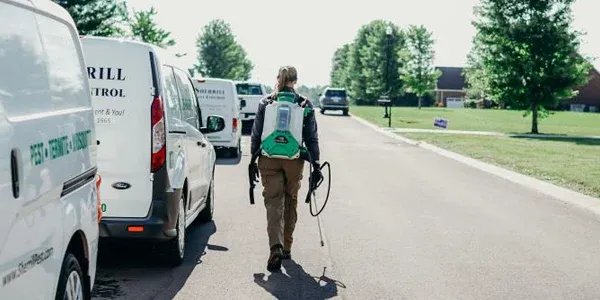 Sherrill Pest Control technician getting ready to spray for mosquitoes